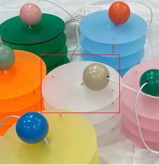 Modern Macaron PH5 adjustable chandelier with frosted glass shade in choice of white, blue, or orange.