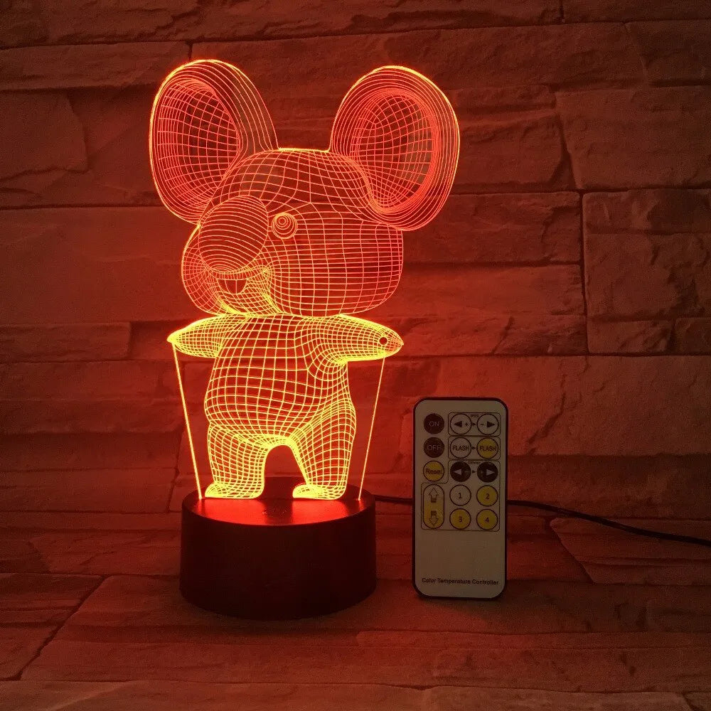Koala-shaped LED night light showing seven colour options on black base with touch or remote control
