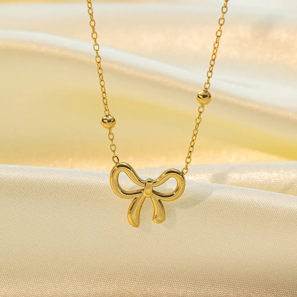 Gold bow necklace with cross chain design adjustable 41-50cm length titanium steel women's fashion jewellery