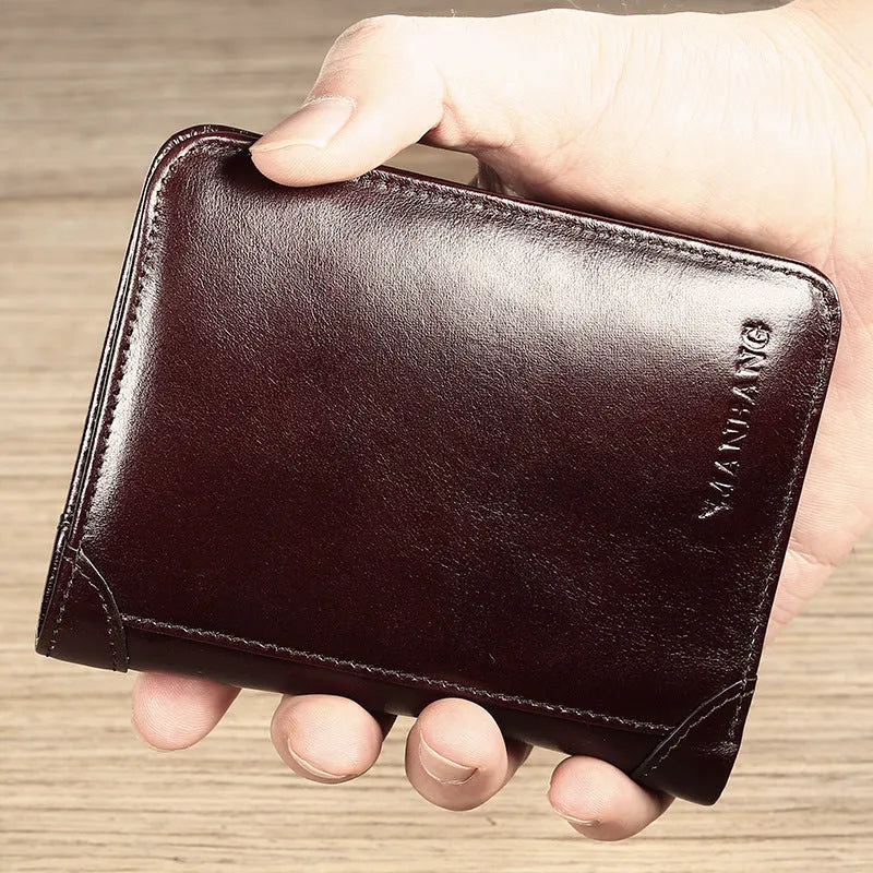 Men's leather wallet open showing photo window, card slots, coin pocket, and banknote compartment.