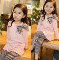Pink cotton clothing set for girls showing coordinated pieces in children's sizes