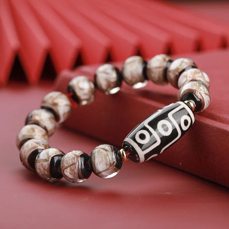 Handmade Chinese-style coloured glaze bracelet with five-colour snake lucky beads in auspicious patterns.