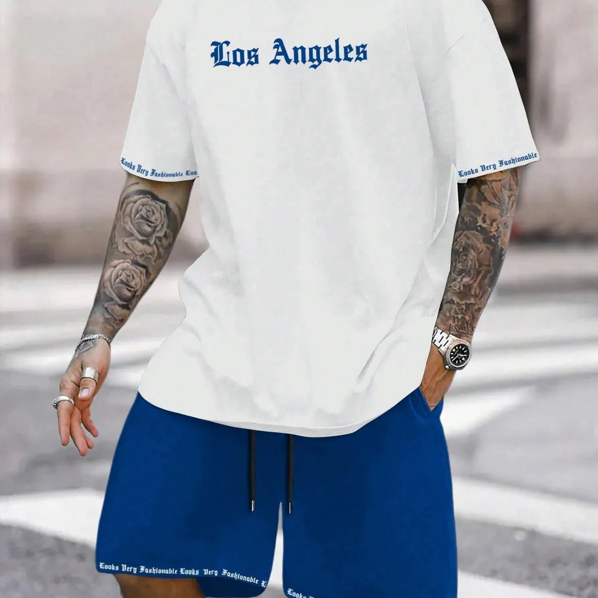 Men's quick-dry polyester sportswear set showing short-sleeved top and matching shorts in a solid colour.