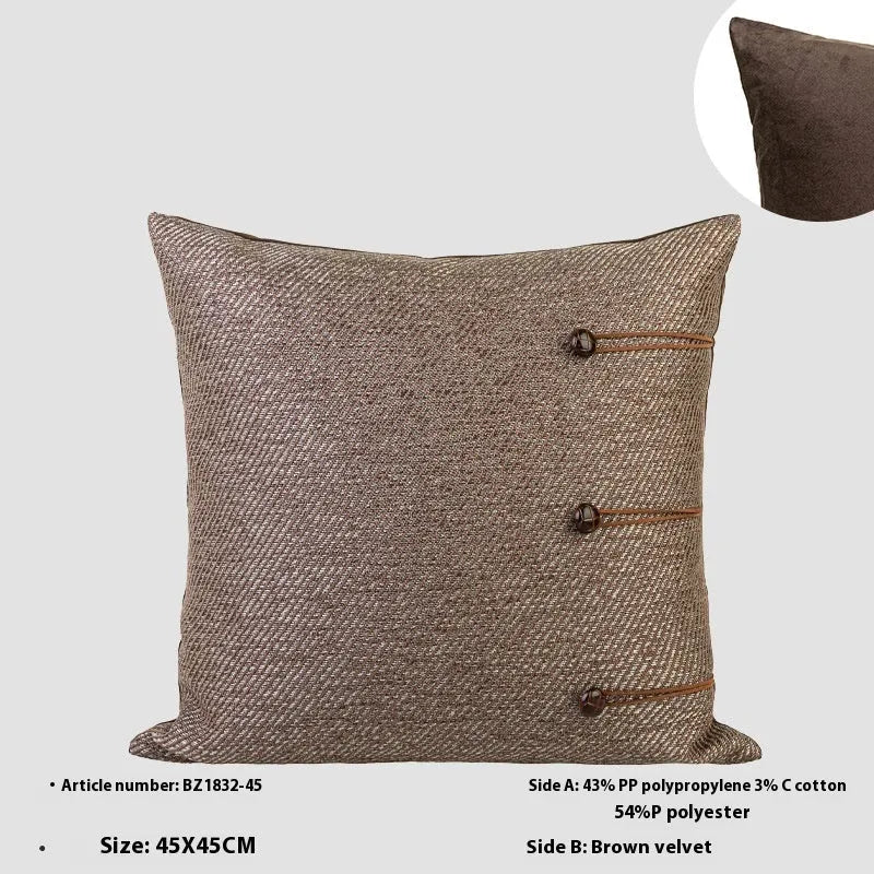 Chinese style square pillow cushion with geometric pattern in Maillard colours on sofa