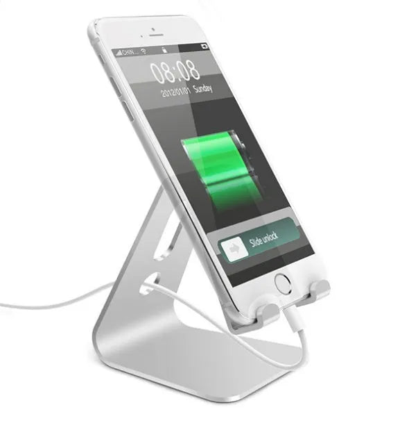 Aluminium alloy universal phone and tablet stand in silver colour on a desk