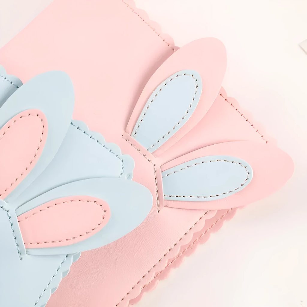 Cute rabbit-themed mini photo album with PU cover in pink, blue, or white, showing loose-leaf pages for 3-inch prints.