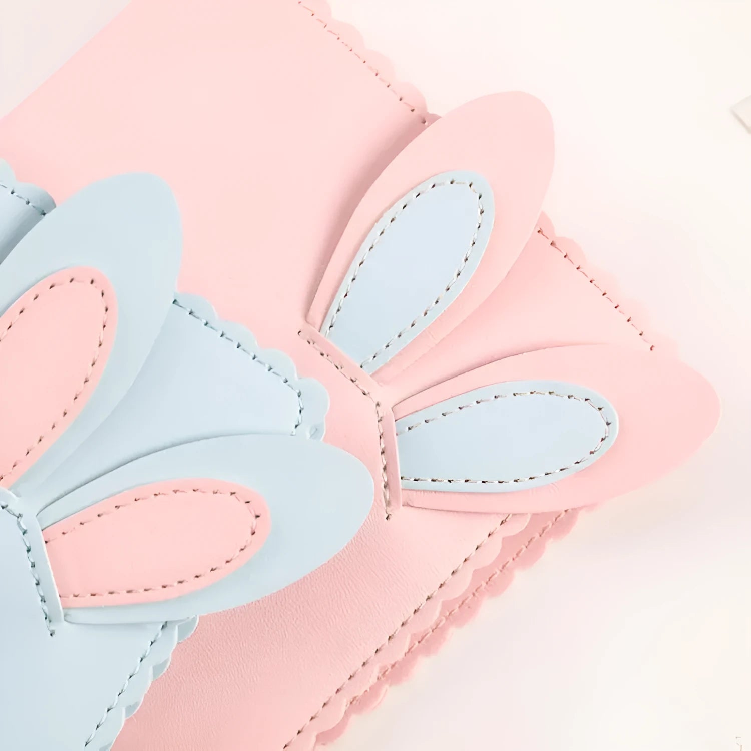 Cute rabbit-themed mini photo album with PU cover in pink, blue, or white, showing loose-leaf pages for 3-inch prints.