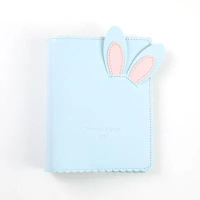 Cute rabbit-themed mini photo album with PU cover in pink, blue, or white, showing loose-leaf pages for 3-inch prints.