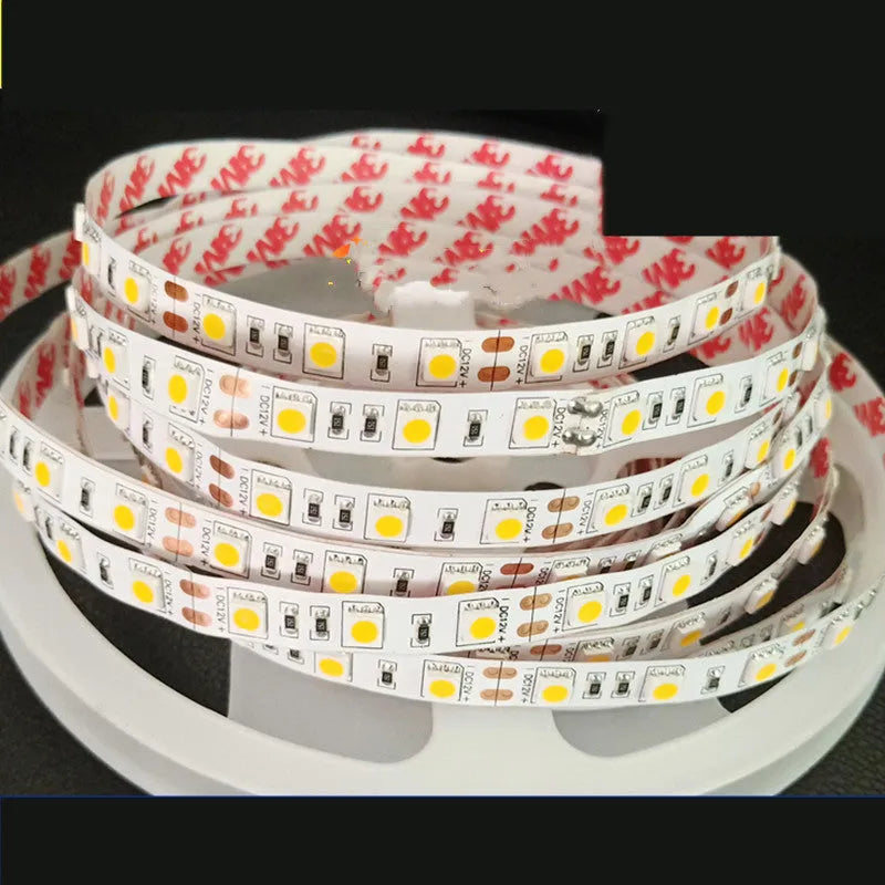 White rectangular 12V LED light strip tape for mounting on supermarket shelves and retail display counters.
