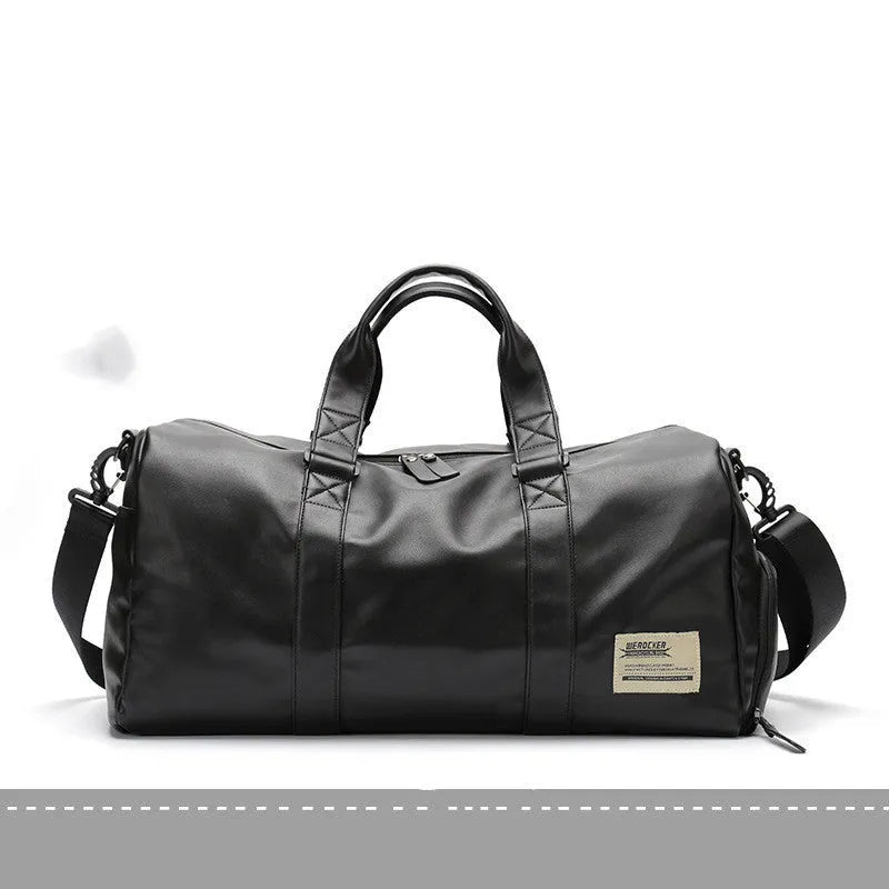 Large black PU leather sports training bag showing multiple zippered pockets and a single shoulder strap.