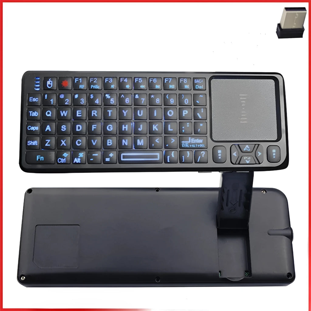 Black wireless mini keyboard with touch screen and optical mouse on desk