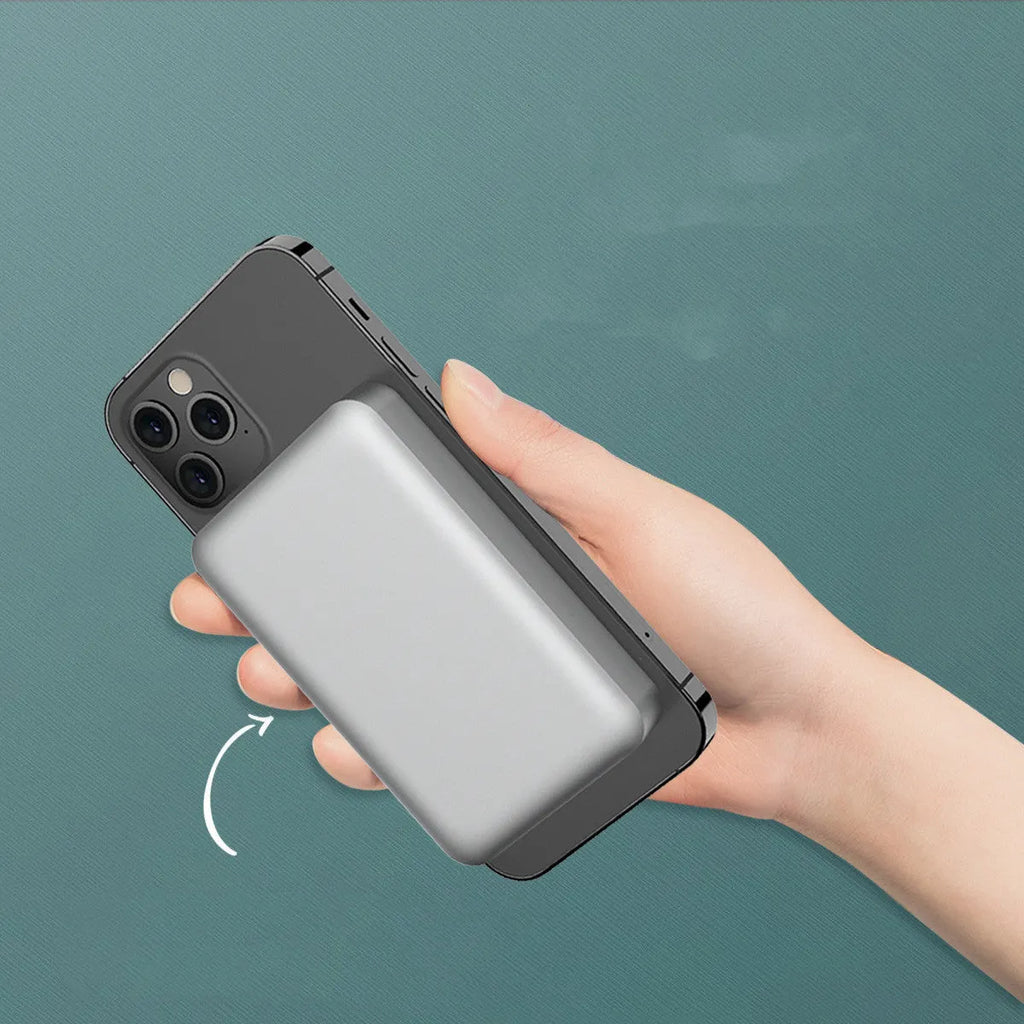 Silver Apple wireless magnetic power bank showing USB-C port and compact dimensions