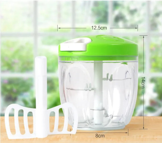 Green manual kitchen chopper with three stainless steel blades and a 500ml capacity bowl.