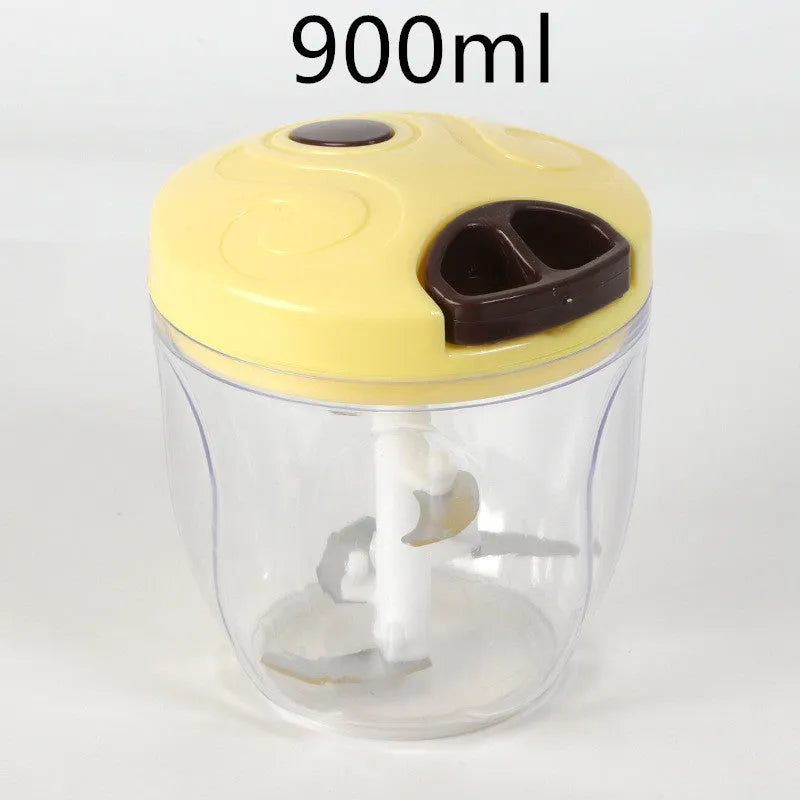 Green manual kitchen chopper with three stainless steel blades and a 500ml capacity bowl.
