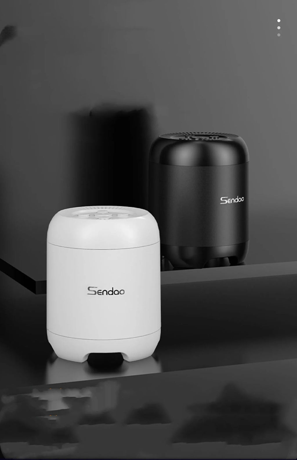 Small black or white wireless Bluetooth speaker with USB port and card reader slot measuring 90x73x73mm