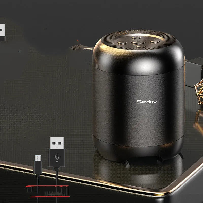 Small black or white wireless Bluetooth speaker with USB port and card reader slot measuring 90x73x73mm
