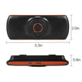 Orange plastic Bluetooth car hands-free speaker designed for sun visor mounting.