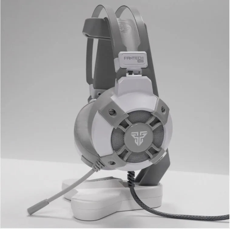 Black FANTECH HG11 over-ear gaming headset with RGB lighting on the earcups and a USB cable.
