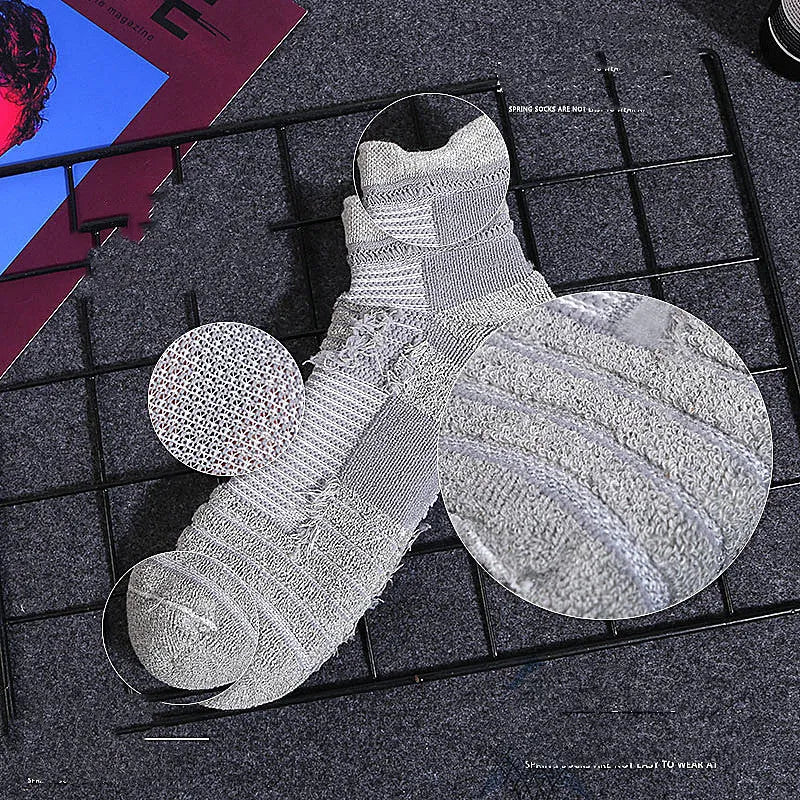 Men's cotton blend sports socks in black, grey, and white with plus size options