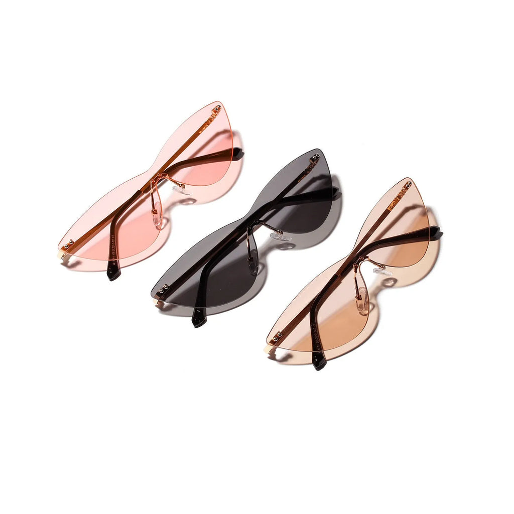 Brown vintage-style metal frame sunglasses with polarised lenses on a plain background.