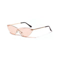 Brown vintage-style metal frame sunglasses with polarised lenses on a plain background.