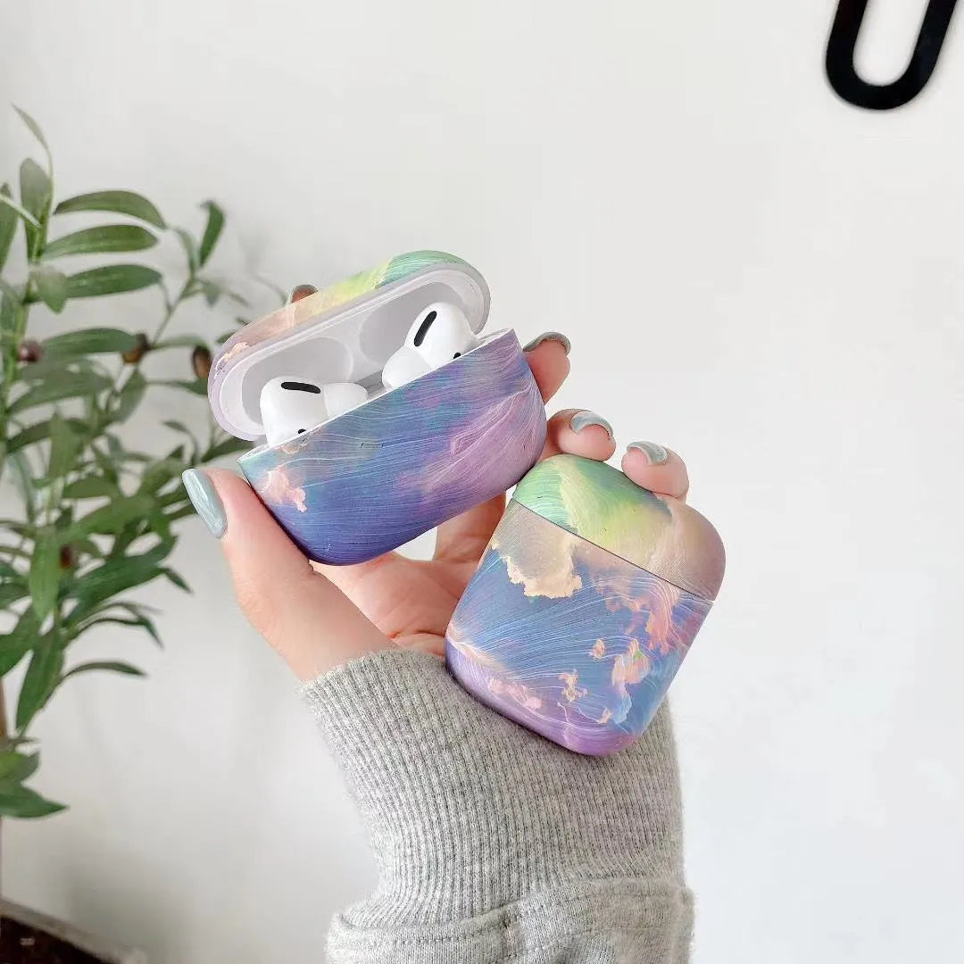 Pink and blue watercolour design plastic protective sleeve for AirPods Pro and AirPods 1/2 charging case.