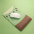 Green kiwi fruit themed mouse pad with built-in wrist support pillow and printed calculator design.