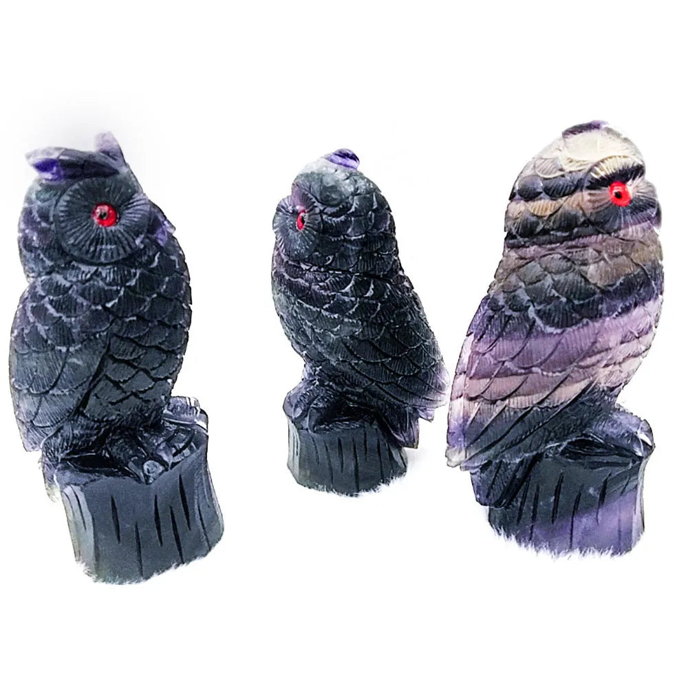 Hand carved purple fluorite owl ornament approximately 4 inches tall with natural stone texture