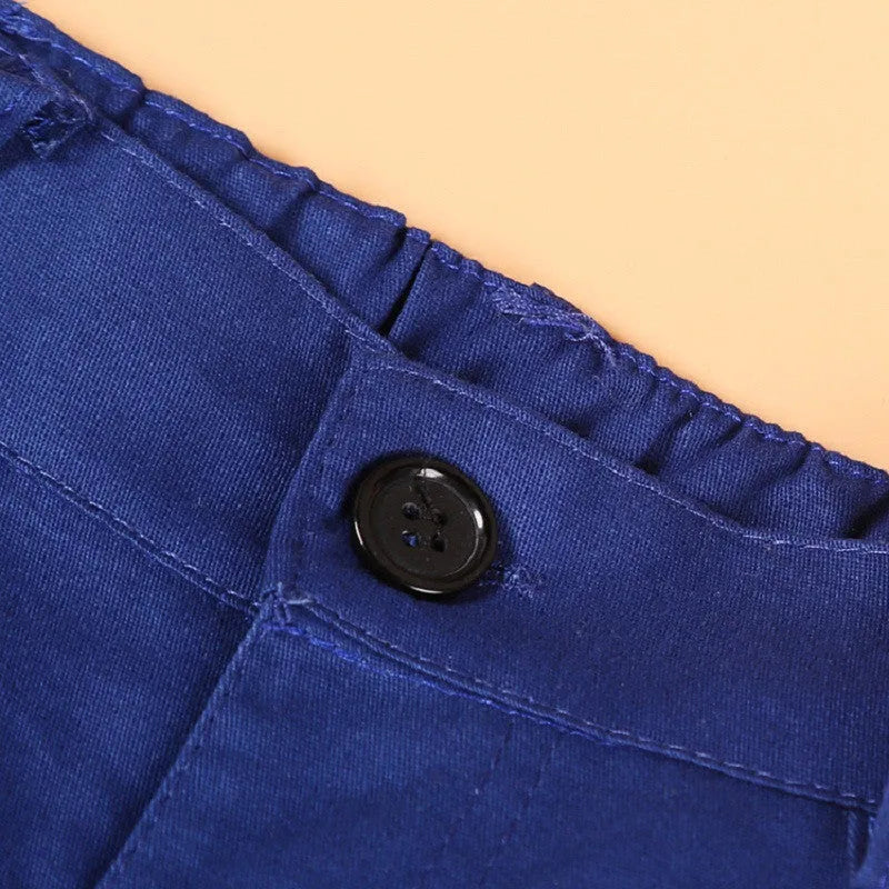 Blue boys' three-piece suit set with vest, tie, and trousers on a hanger.