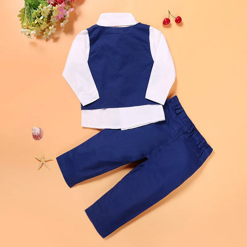 Blue boys' three-piece suit set with vest, tie, and trousers on a hanger.