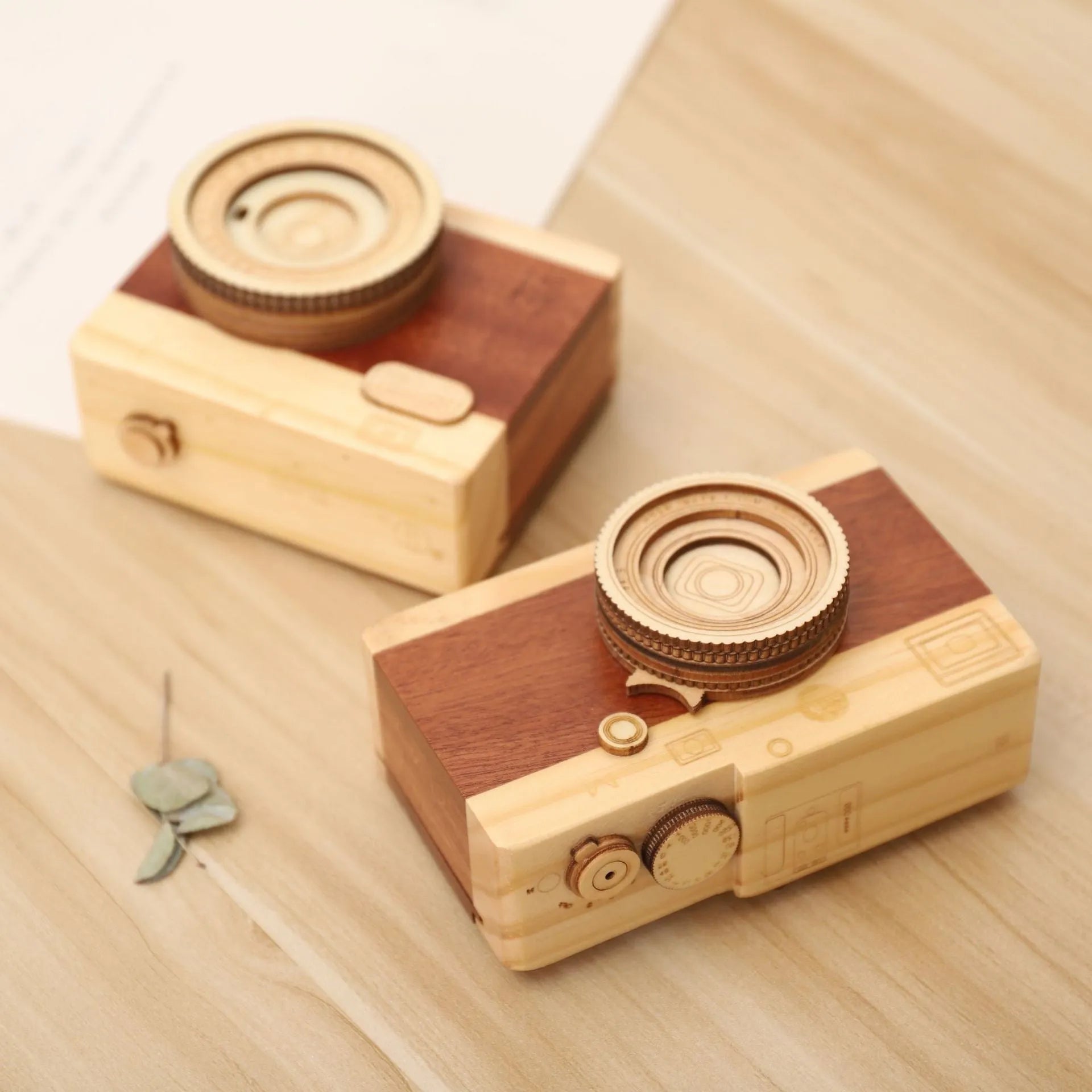 Wooden camera music box with rotating mechanism on pine wood base
