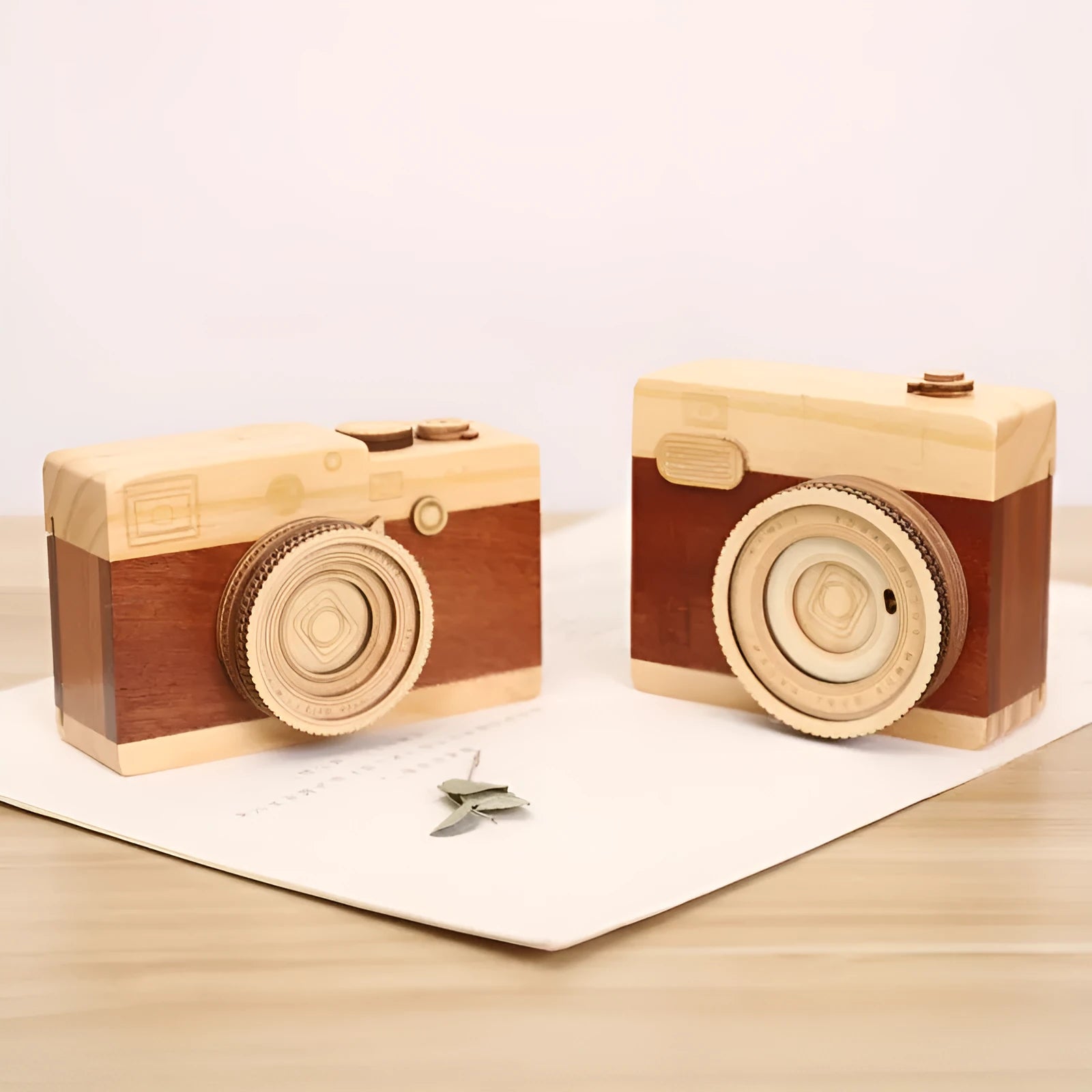 Wooden camera music box with rotating mechanism on pine wood base
