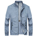 Kentino light blue mens casual summer shirt with short sleeves on a hanger.
