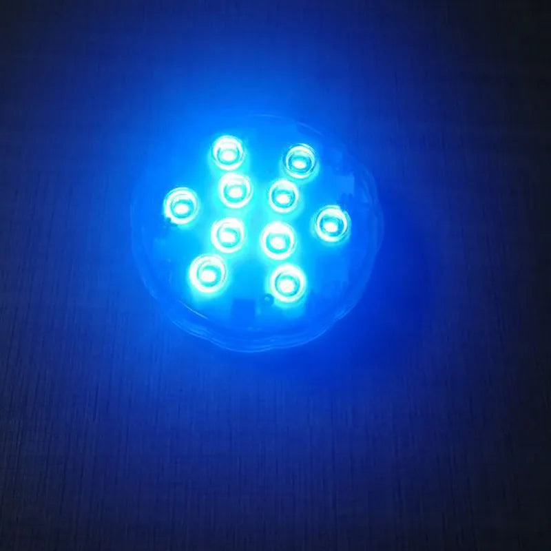 White waterproof LED light with remote control for pool and garden decoration.