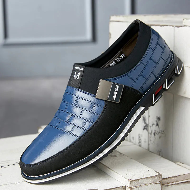 Men's blue imitation leather low-top casual shoe shown on a size chart background.