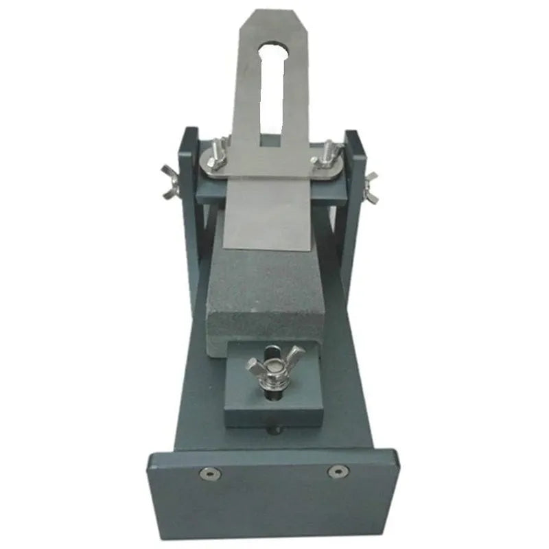 Fixed angle sharpening tool made of aluminium alloy and stainless steel for sharpening woodworking chisels and knives.