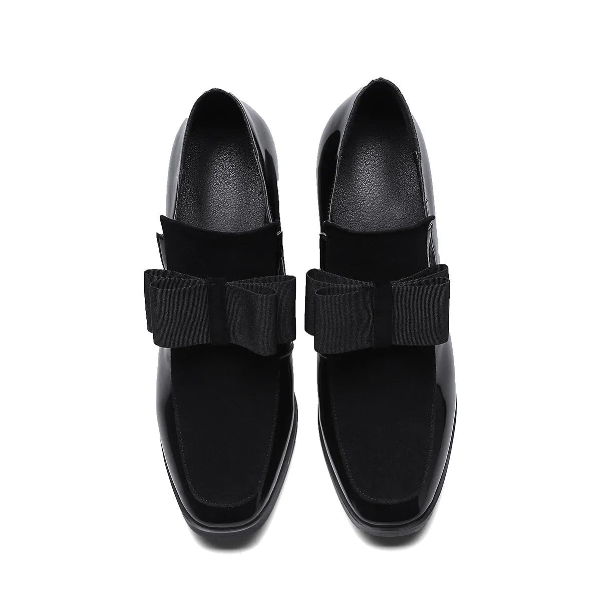 Women's black patent leather high heels with a thick square heel and square toe.