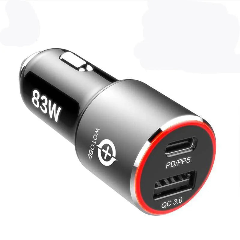 Dual-port 83W fast car charger with two USB-C ports and an included fast charging cable on a car dashboard.