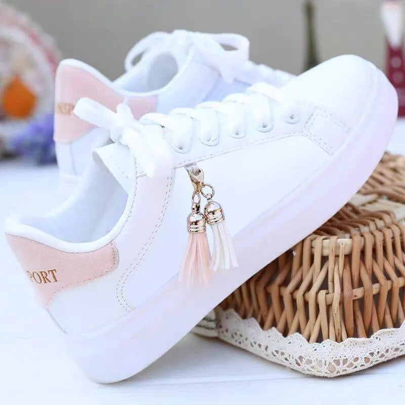 Women's black and pink mesh fashion casual shoes with a flat rubber sole.