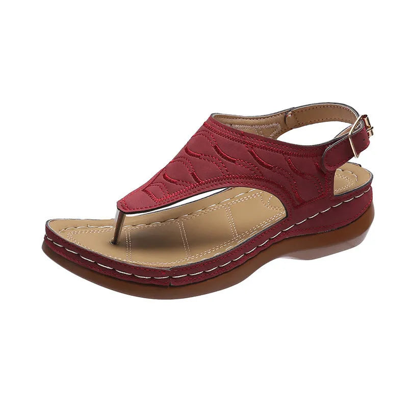 Women's casual wedge heel sandals with adjustable buckle strap in solid red colour