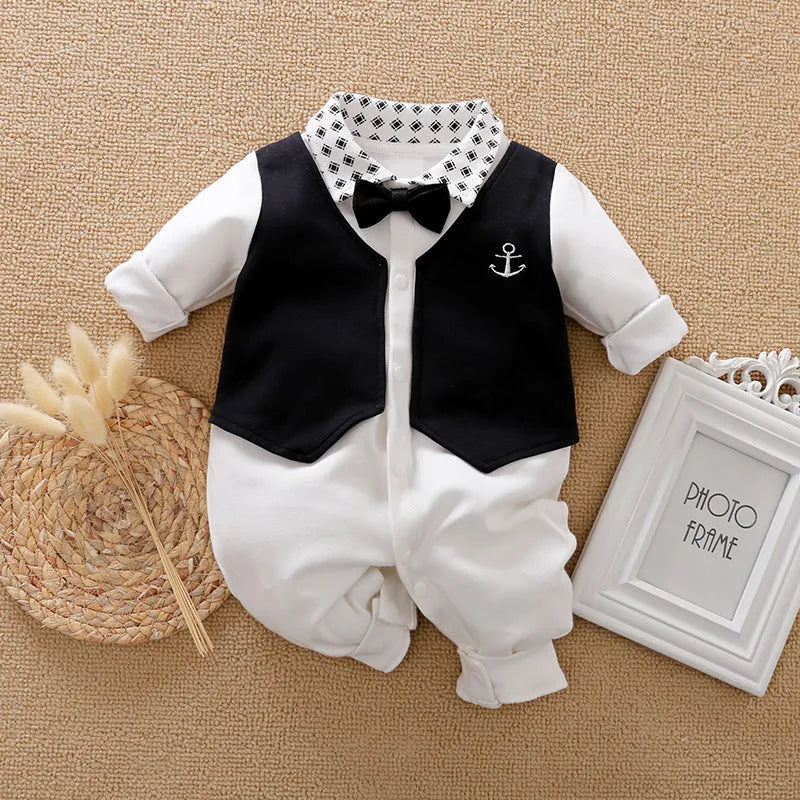 Baby wearing a long-sleeved cotton jumpsuit in a navy blue gentleman style