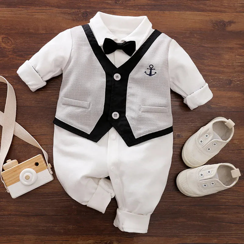 Baby wearing a long-sleeved cotton jumpsuit in a navy blue gentleman style