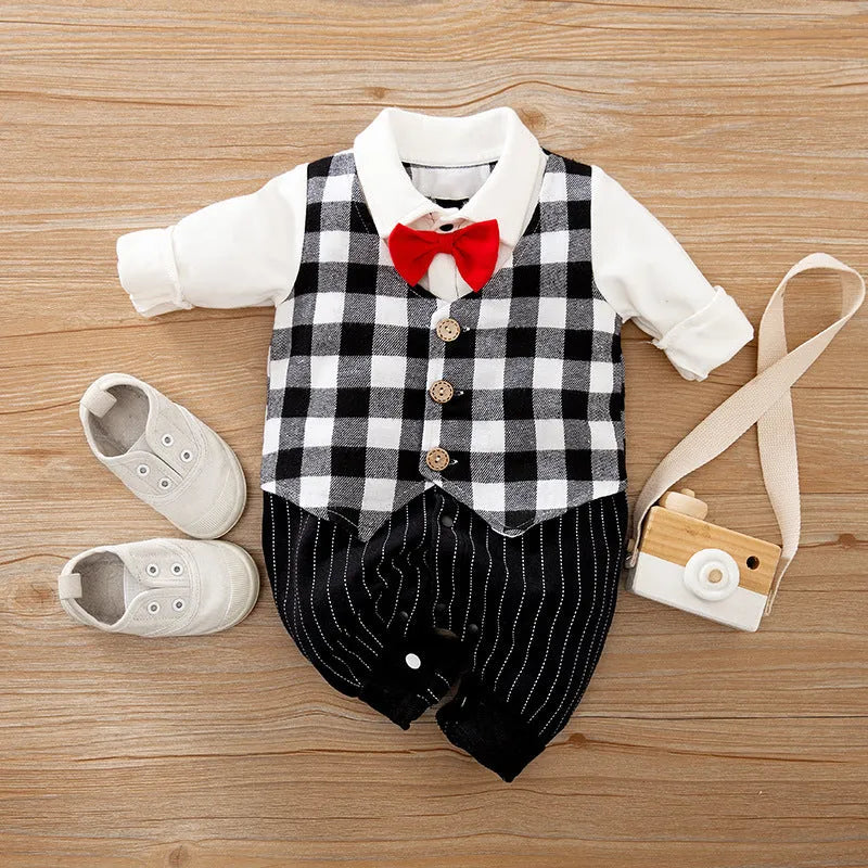 Baby wearing a long-sleeved cotton jumpsuit in a navy blue gentleman style