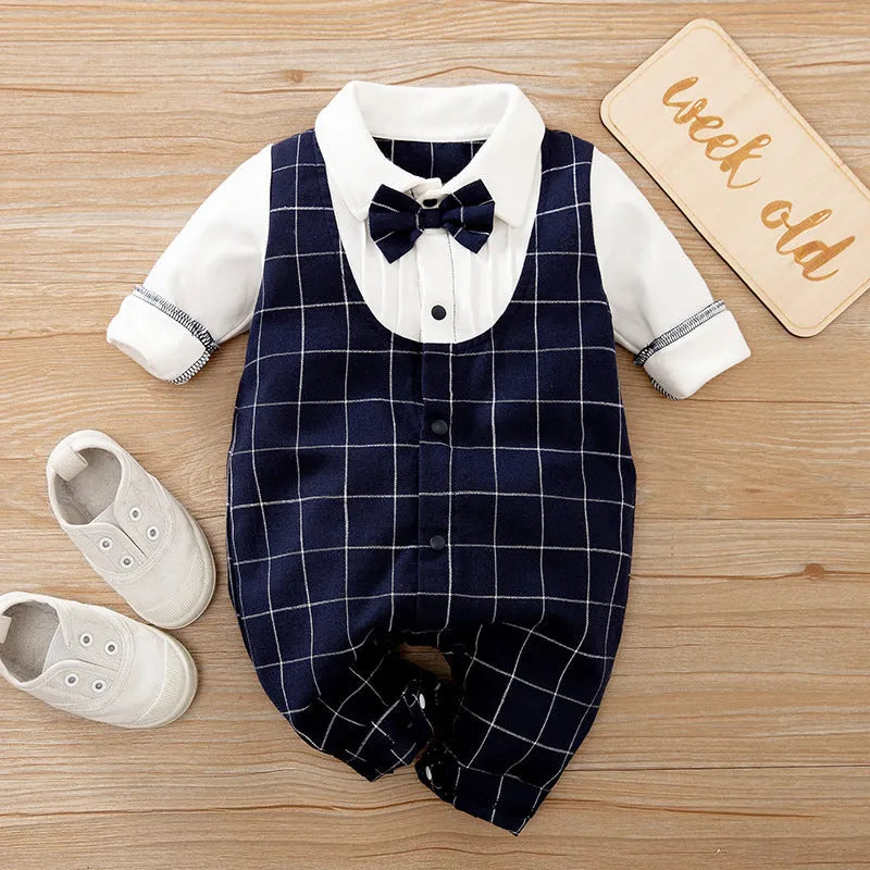 Baby wearing a long-sleeved cotton jumpsuit in a navy blue gentleman style