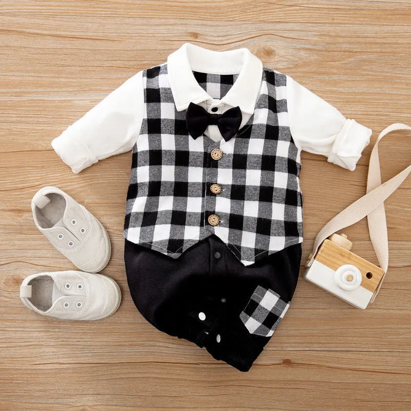 Baby wearing a long-sleeved cotton jumpsuit in a navy blue gentleman style