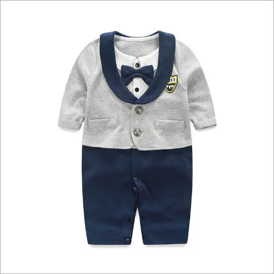Baby wearing a long-sleeved cotton jumpsuit in a navy blue gentleman style
