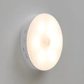Wireless motion sensing LED light for night-time hallway and cabinet illumination