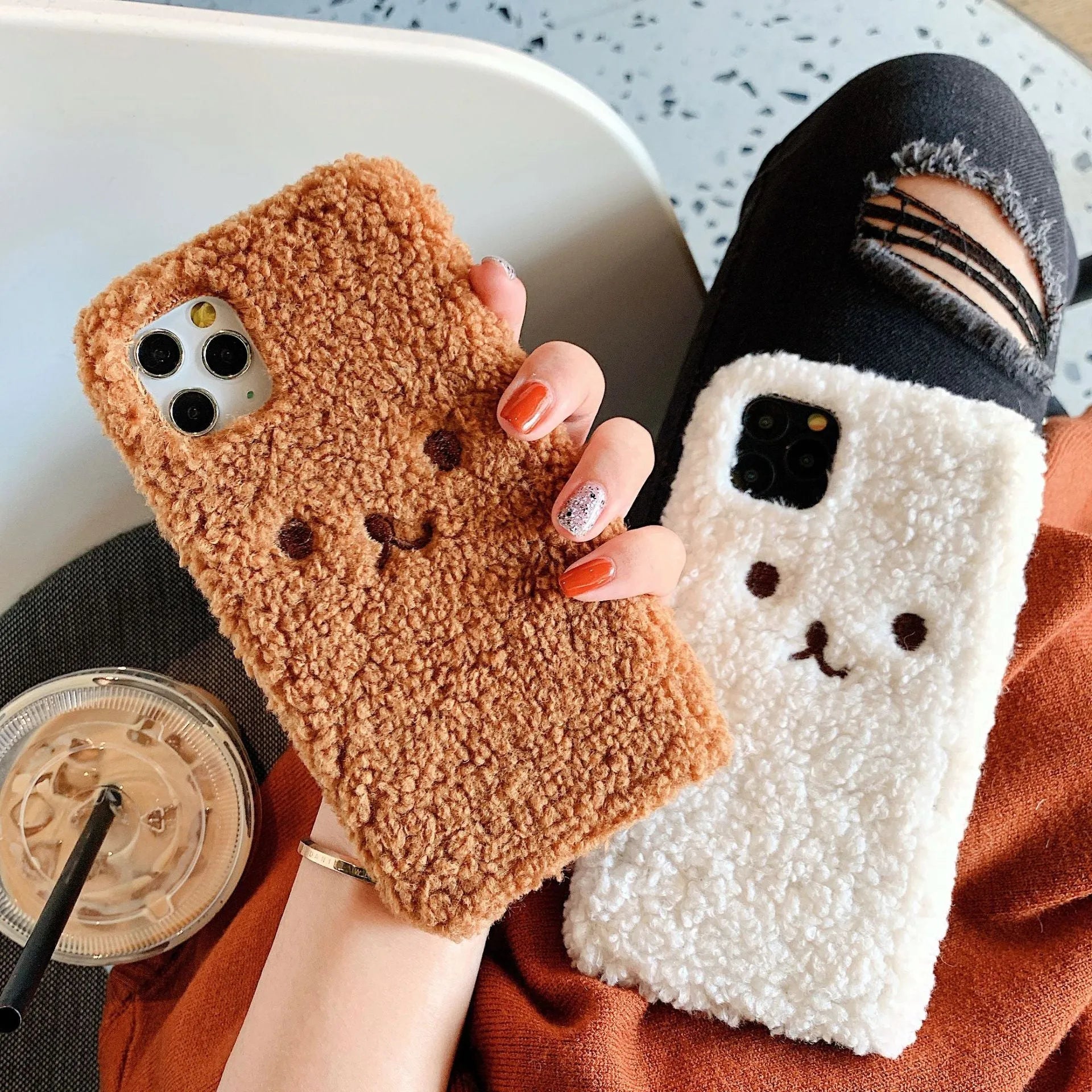 Brown embroidered plush cartoon bear face on a soft TPU iPhone case for iPhone 11.