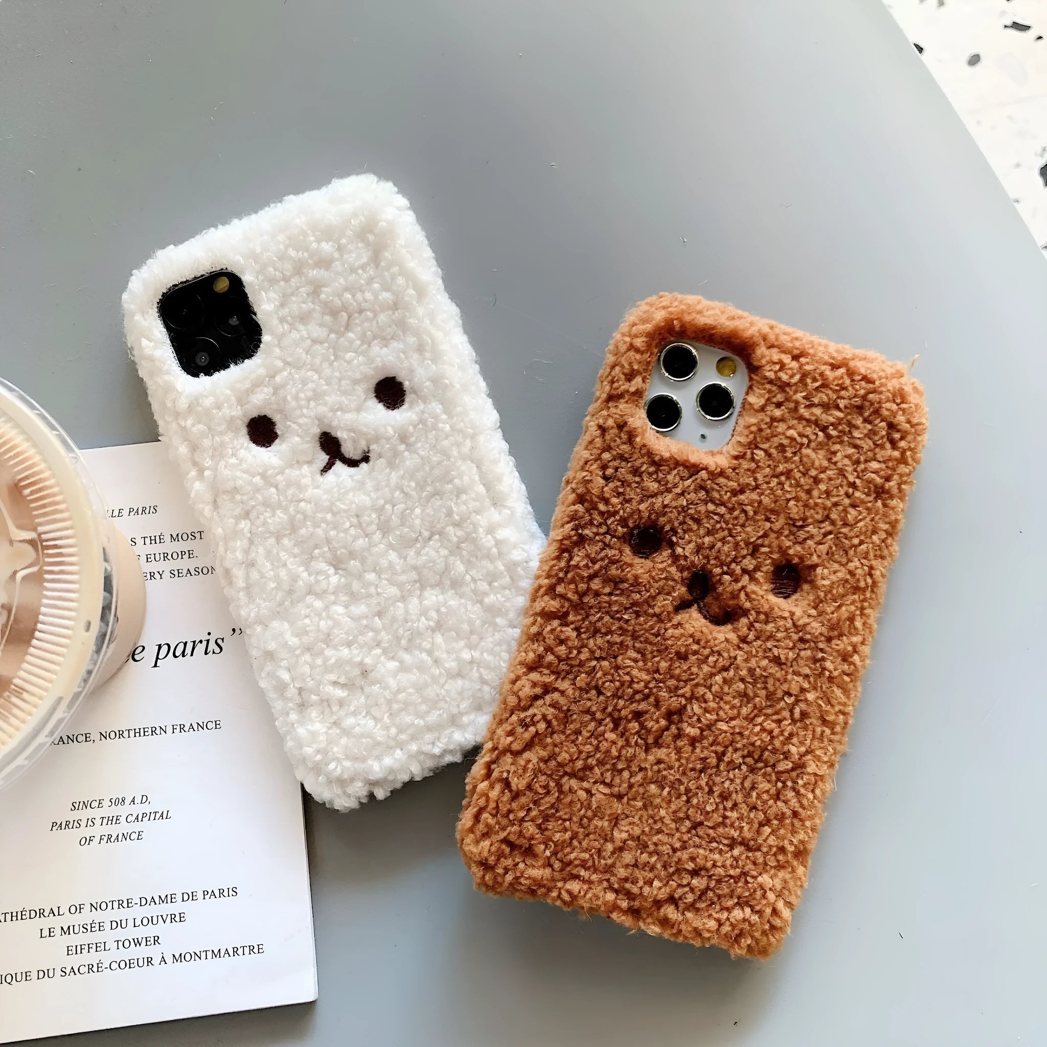 Brown embroidered plush cartoon bear face on a soft TPU iPhone case for iPhone 11.