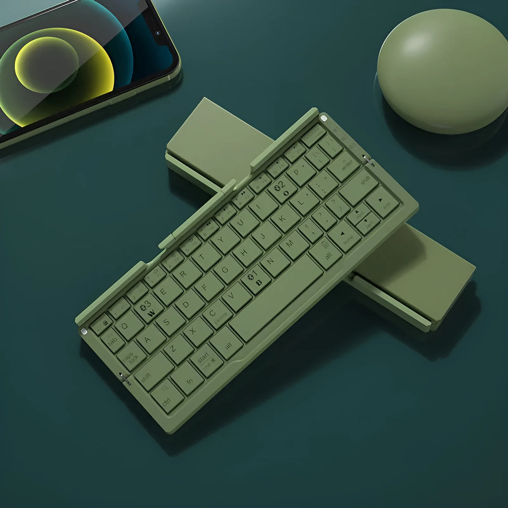 Silver white folding Bluetooth keyboard opened with stand supporting tablet